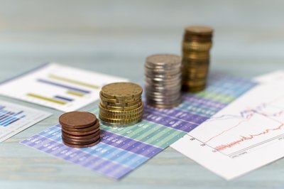 currency-change-piles-coins
